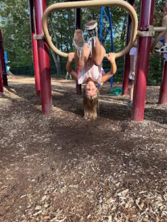 After School Program - Girl Playing on Play Structure