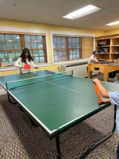 After School Program - Kids Playing Ping Pong and Foosball