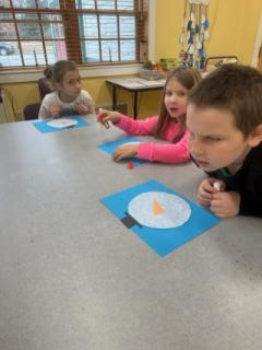 December Vacation Camp - Kids Making Paper Snowmen